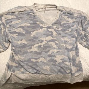 Calvin Klein size small camo blue performance short sleeve top. Loose fitting